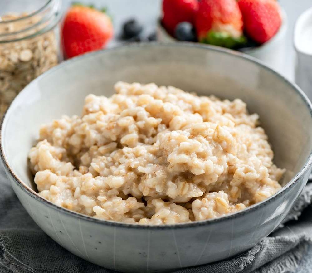 Steel-cut oatmeal in light blue bowl.