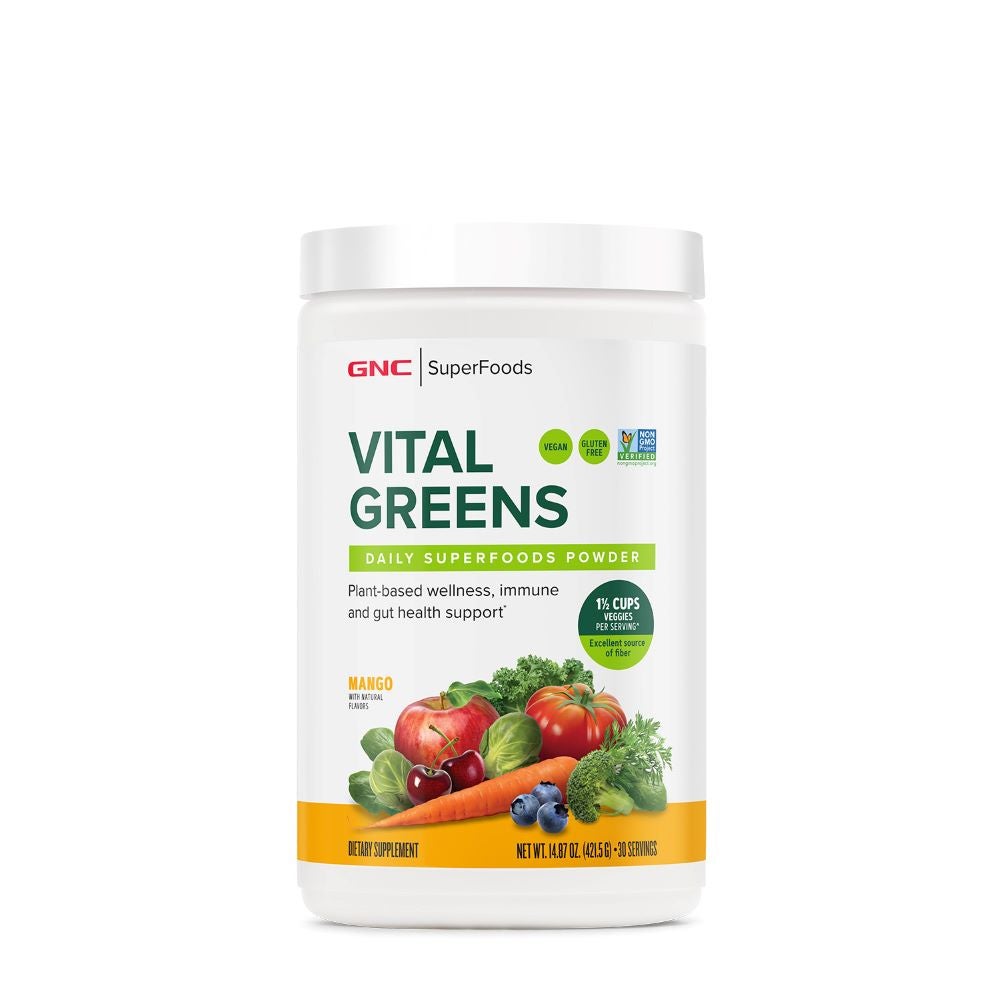 White tub with GNC Vital Greens superfood powder supplement.