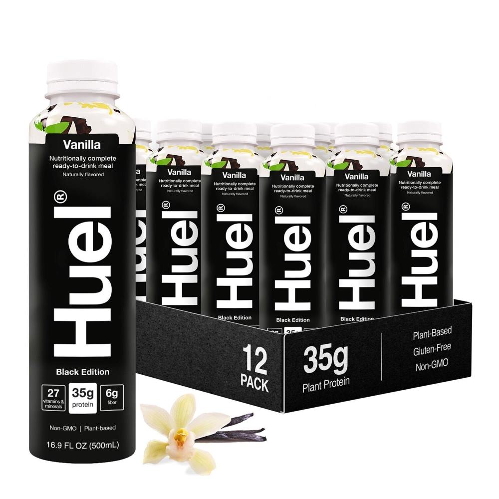 Case of Huel's vegan protein shake, black bottles with white letters.
