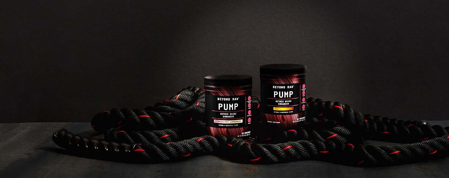Two tubs of Beyond Raw Pump with battle rope